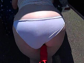 Did you see that milf's fat ass getting fucked by her girlfriend's strap-on outdoors?
