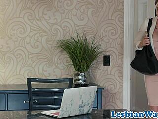 Two seductive lesbians indulge in oral pleasure with close-ups