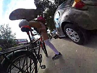 Exhibiting in miniskirt in the city.