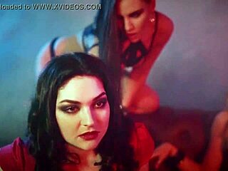 Alex Angel creates a sensual lesbian song with kissing and group intimacy.