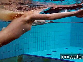 Milana And Katrin Strip Each Other Underwater