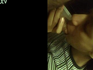 married woman performs sucking task in the kitchen setting