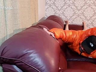 Humping leather sofa in north face down jacket while wanking