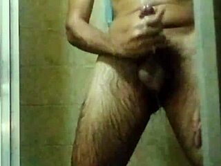 I take a bath and jerk my big Brazilian cock until I cum hard in the shower