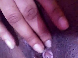 Chinese girl plays with her wet clit and pussy