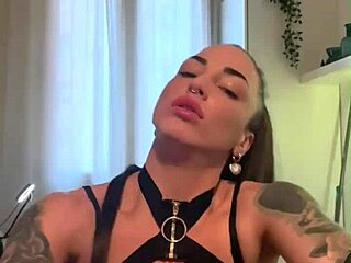 I dance sexy in leather lingerie as tattooed brunette with big tits masturbates to orgasm with dildo