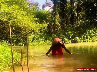 Intense hardcore pounding of African whore with big dick by the stream