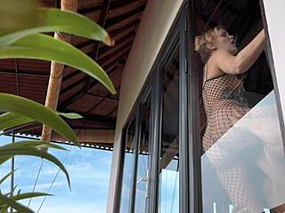 I felt thrilled recording a cute blonde babe in fishnets and lingerie. She looked pretty bending over beautifully.