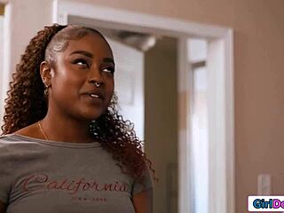 Ebony roommate with big tits and shaved pussy uses dildo for squirting orgasm in interracial lesbian dorm session with 69 licking and tribbing