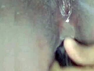 amature ebony mature masturbates on webcam