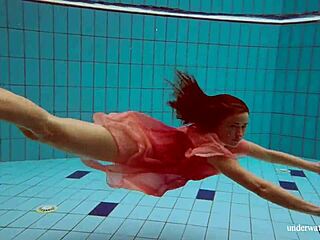 Deniska strips shaved teen body underwater