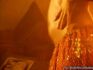 exotic brunette babe strips sensually letting passions rip clothes